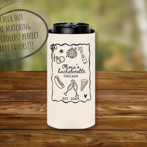 May include: A cream-colored can cooler with a black top, featuring a black outline design for a bachelorette party. The design includes a disco ball, champagne bottle, pizza slice, and the text "Olivia's bachelorette CHICAGO EST. 20XX".