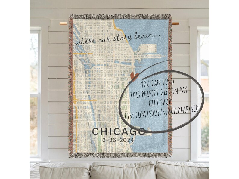 May include: A woven tapestry featuring a map of Chicago, Illinois, with the text "where our story began..." and "CHICAGO 3-36-2024". The tapestry has a light blue background and a brown fringe.