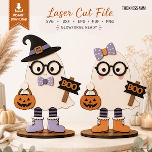 Può includere: Due figure di fantasmi in legno tagliate al laser su basi circolari. Ogni fantasma indossa occhiali neri, tiene un secchiello a forma di zucca arancione e un cartello con la scritta BOO. Uno indossa un cappello da strega, l'altro un fiocco a pois.