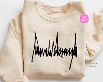 ドナルド・トランプのシグネチャー・スウェットシャツ、共和党員向けスウェットシャツ、トランプ愛好家向けスウェットシャツ、アメリカ旅行ギフト・スウェットシャツ、愛国心あふれるクリスマスギフト・スウェットシャツ