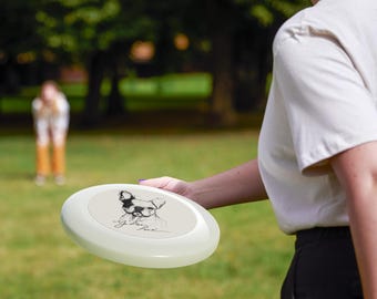 Ilustración esquemática de un bulldog francés jugando al frisbee/disco volador.