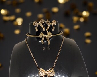 Gold Bow Jewelry Set: Ribbon Necklace, Earrings, Bracelet, Ring