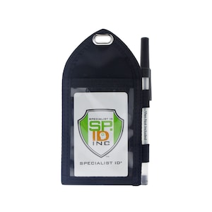 May include: Black badge holder with a clear plastic window for displaying an ID card. The holder has a loop for attaching a lanyard and a pen holder on the side. The text "Specialist ID" is printed on the holder.