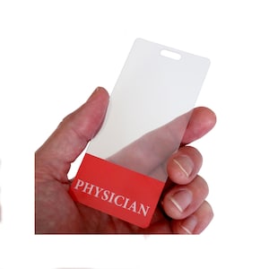May include: A clear plastic ID card holder with a red bottom section that says "PHYSICIAN" in white text.