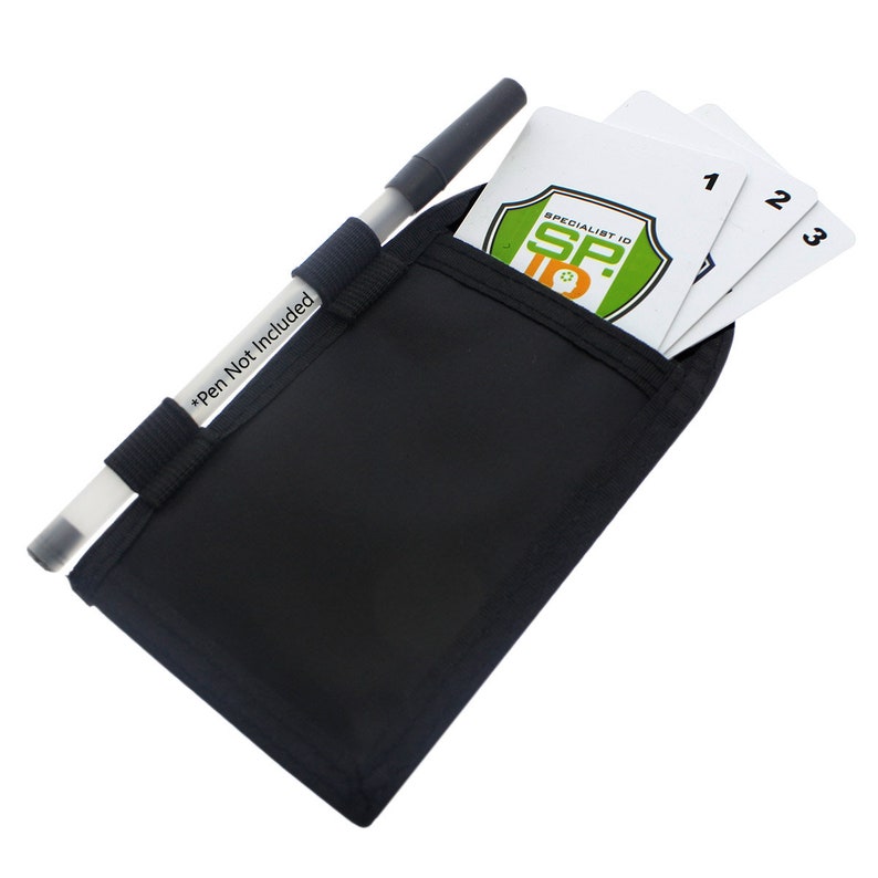 May include: Black pouch with a pen and cards inside. The cards have the text "Specialist ID" and "SP." with a green and orange logo. The cards are numbered 1, 2, and 3. The pouch has a strap to hold a pen. The text "*Pen Not Included" is printed on the strap.