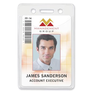 May include: A white plastic ID card holder with a clear front and a pocket on the back. The holder has two holes at the top for a lanyard. The ID card inside the holder has a barcode, a company logo, and a photo of a man. The text on the card reads "ITF-14", "MANAGEMENT GROUP", "JAMES SANDERSON", and "ACCOUNT EXECUTIVE".