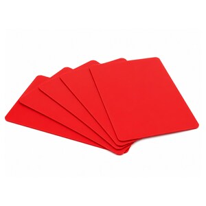 May include: A set of five rectangular, solid red sheets with rounded corners, arranged in a fanned-out overlapping stack. Each sheet has a smooth, matte surface and a uniform, vibrant red color throughout, presented against a plain white background.