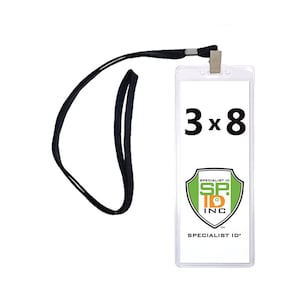 May include: A clear plastic badge holder with a black lanyard. The badge holder is 3 inches by 8 inches and has the text "3 x 8" printed on it. The badge holder also has a logo for "Specialist ID Inc."