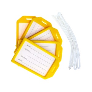 May include: Set of five yellow luggage tags with white labels. Each tag has spaces for name, address, telephone, and email. The tags are attached to clear plastic loops.