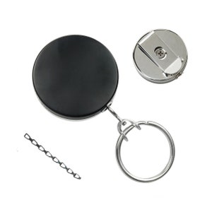 May include: A black retractable key chain with a silver chain and a silver clip. The chain is extended and the clip is attached to a silver ring.