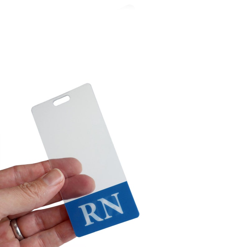 Clear RN badge buddy vertical for registered nurses - Top portion is transparent and bottom RN title is printed on both sides with a blue border