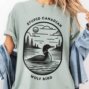 Camisetas personalizadas com mergulhões | Camiseta, moletom gola redonda, moletom com capuz | Camiseta "Pássaro Lobo Canadense Estúpido" | Deixe-me um mergulhão | Mergulhão-a-tico