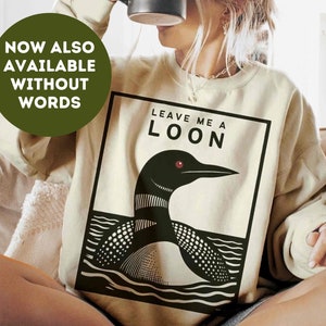 Leave Me A Loon Sweatshirt | Linocut Style Common Loon on a Lake Unisex Crewneck