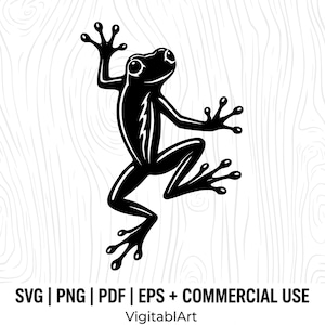 May include: Black silhouette of a frog climbing on a light wood grain background. The frog is stylized with large eyes and splayed toes. Text at the bottom reads "SVG | PNG | PDF | EPS + COMMERCIAL USE" and "VigitablArt".