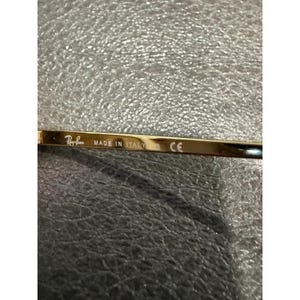 Gafas de sol Ray Ban RB 1971 con montura cuadrada dorada y lentes marrones, modelo 54019, fabricadas en Italia. imagen 9