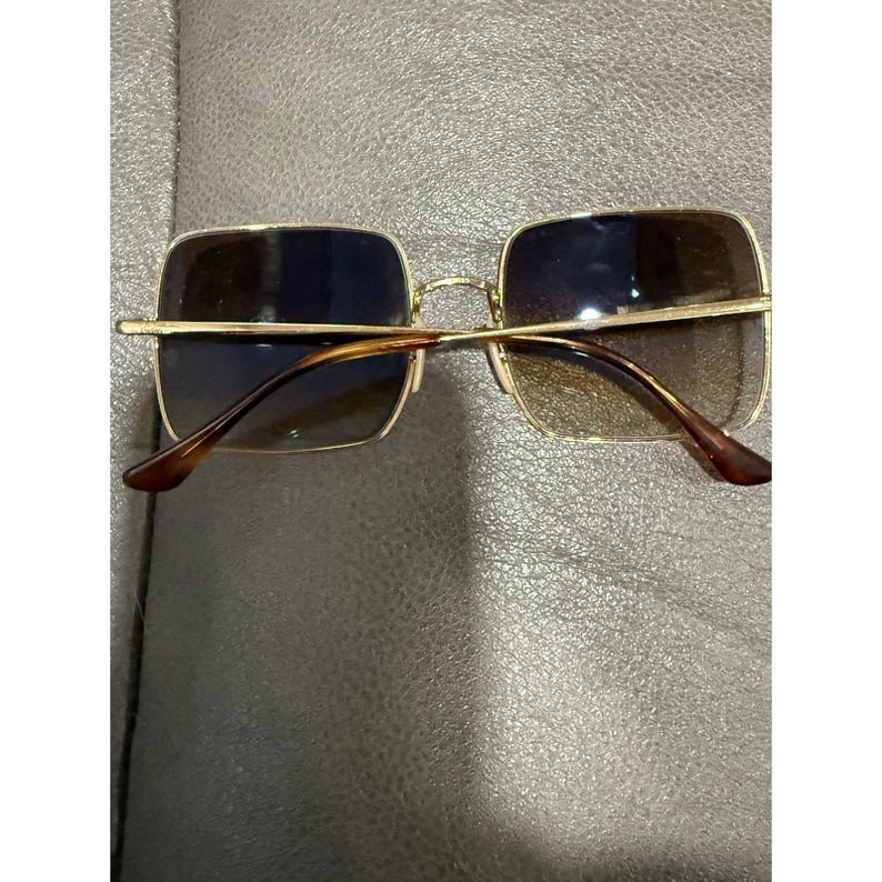 Gafas de sol Ray Ban RB 1971 con montura cuadrada dorada y lentes marrones, modelo 54019, fabricadas en Italia. imagen 5