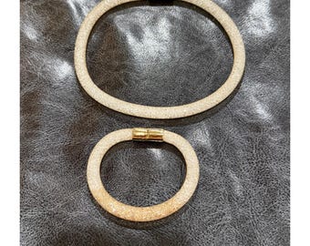 Set collana e bracciale Swarovski Stardust con maglia di cristalli dorati e chiusura magnetica (2 pezzi)