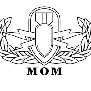 May include: Black and white military-style badge with a central shield shape, lightning bolts, and laurel leaves. The word "MOM" is printed in bold letters at the bottom of the badge. The design is a tribute to mothers.