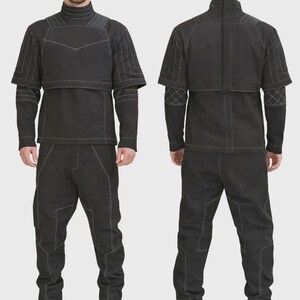 May include: A black two-piece outfit consisting of a long-sleeved top and matching pants. The top features a high collar, a layered chest panel, and white contrast stitching. The pants have a structured fit with white seam detailing throughout.