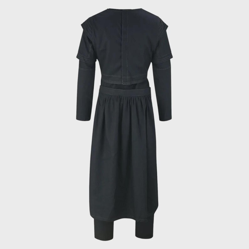 May include: A solid black long-sleeved garment featuring a cropped bodice with structured shoulders and a high neckline, paired with a matching high-waisted, pleated midi-length skirt. The ensemble is constructed with visible tonal stitching.