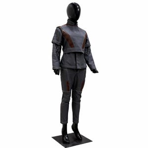 May include: A grey two-piece outfit consisting of a high-neck top with brown shoulder panels and long sleeves featuring a diamond-stitched pattern, paired with matching grey trousers that have brown accents and visible white stitching throughout.