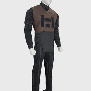 May include: A costume set featuring a brown chest piece with a black H-shaped emblem, a black turtleneck long-sleeve shirt with white horizontal line patterns, a black padded waist guard, and black trousers with white contrast stitching details.