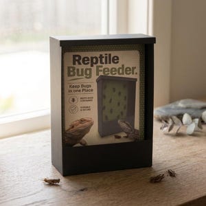 May include: A black rectangular reptile bug feeder box with a product card featuring the text Reptile Bug Feeder, Keep Bugs in one Place, Keeps Bugs Contained, and Durable & Secure, along with images of a bearded dragon and the feeder itself.