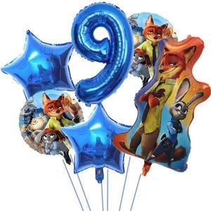 May include: A collection of foil balloons, including a large blue number 9 and several star-shaped balloons. The balloons feature characters from the animated movie "Zootopia", with images of Nick Wilde and Judy Hopps.
