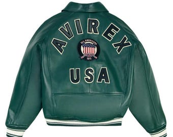 Chaqueta bomber de cuero Avirex verde para hombre, estilo aviador vintage.