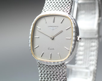 Near MINT Longines 976 3386 30mm Quartz L976.2 Silver Dial Men's