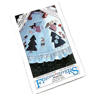 May include: A pattern for a ruffled Christmas tree skirt. The skirt features appliqued Christmas designs, including trees, a snowman, and angels. The pattern includes complete instructions and full-size patterns.