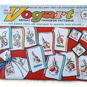 May include: A vintage Vogart repeat transfer pattern envelope featuring illustrations of kitchen linens with embroidered fruit and vegetable designs. The red and white packaging includes the text 'New Fashion Vogart Repeat Transfer Patterns' and 'Gay Garden Fruits and Vegetables to Brighten Your Kitchen' with the number 211.