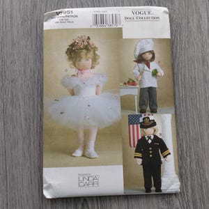 May include: Vogue Doll Collection pattern V7951 featuring three doll outfits: a white tutu with floral headpiece, a white chef uniform with hat, and a black military-style suit with a peaked cap. The envelope includes the designer name Linda Carr.