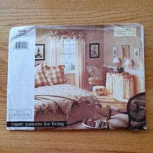May include: A vintage Vogue pattern for living room decor. The pattern features a bedroom scene with a floral bedspread, matching pillows, and a valance. The package is labeled "1646" and "ONE SIZE".