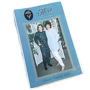 May include: A vintage sewing pattern booklet titled "A Little More Effect and Pattern Company." The cover features a photo of two women modeling clothing. The booklet has a blue border and the words "Classic Comfort #0510."