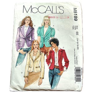May include: A vintage McCall's sewing pattern envelope featuring illustrations of four different blazer styles. The blazers are in various colors, including purple, teal, and red. The pattern number is M5189, and the size is EE (14-16-18-20).