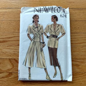 May include: A vintage sewing pattern envelope with illustrations of two women in beige outfits. The envelope has the text "NEW LOOK" and the number "6243". The outfits include a jacket, trousers, and a skirt.