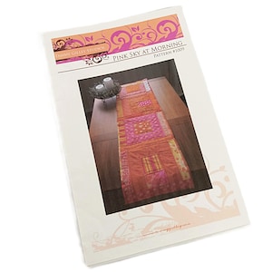 May include: A set of three ceramic mugs with a speckled, matte finish. Each mug is a different colour: light blue, cream, and grey. The mugs have a simple, modern design and a comfortable handle.