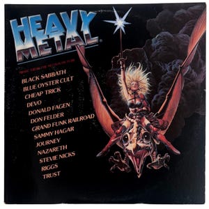 May include: A vinyl record cover for the Heavy Metal motion picture soundtrack. The black cover features a blonde figure riding a large winged creature while holding a glowing sword. A list of artists including Black Sabbath and Journey is printed.