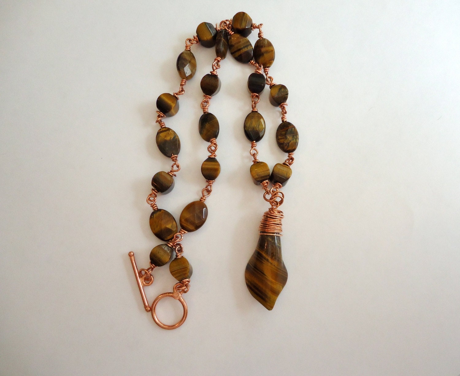 Tiger eye fish charm necklace main image 0