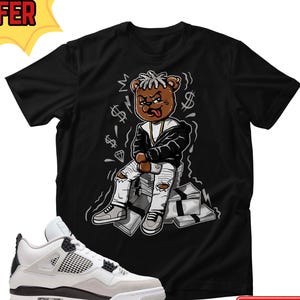 Maglietta Money Talks – T-shirt grafica unisex abbinata alle Jordan 4 Retro Military Black, moda streetwear, outfit alla moda, regalo per gli amanti delle sneaker