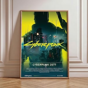Op de afbeelding: Een ingelijste poster met een futuristisch stadsbeeld en de tekst "CYBERPUNK" in neongeel. De poster toont een silhouetfiguur met een wapen, met de tekst "CYBERPUNK 2077" eronder. De datum "10 12 2020" staat onderaan.