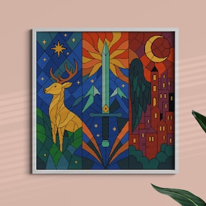 May include: A framed art print with a stained-glass style design. The artwork is divided into three vertical panels. The left panel depicts a golden deer in a forest. The centre panel shows a sword and sun. The right panel shows a wing, moon, and city.