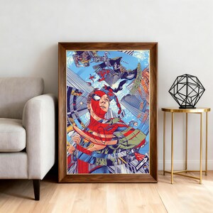 May include: A framed art print featuring a vibrant illustration of Spider-Man in a dynamic pose, set against a backdrop of a cityscape and other superheroes. The artwork is framed in a dark wood frame.