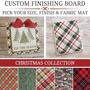 May include: A custom finishing board for needlework featuring a square display with a red bow and a cross-stitched tree design with the text TIS THE SEASON. The collection includes various fabric mats with plaid, floral, and holiday-themed patterns.