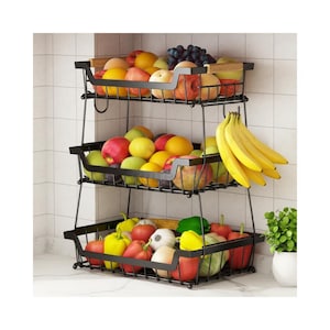 May include: A three-tiered black metal fruit basket filled with various fresh fruits and vegetables. The top basket holds apples, oranges, and grapes. The middle basket contains apples and lemons. The bottom basket is filled with bell peppers, tomatoes, and onions. A bunch of bananas hangs on the side.