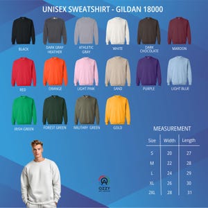 May include: A display of Gildan 18000 unisex sweatshirts in various colors, including black, gray, white, red, orange, and green. The image also shows a white sweatshirt on a person and a measurement chart with sizes ranging from S to 2XL, with widths from 20 to 28 inches.