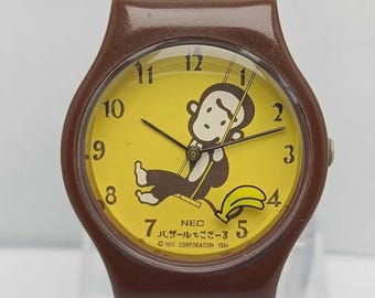 Reloj vintage para niños Monkey Banana de 1991 de NEC Corporation