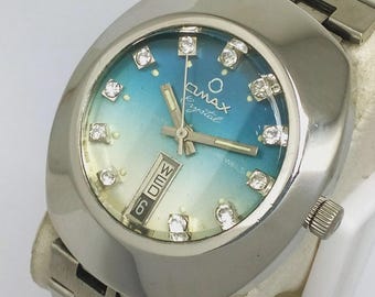 Relógio masculino vintage Omax Crystal automático dia/data mostrador azul