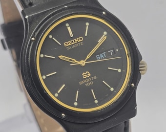 1985 Seiko 6923-7029 Two-tone Quartz Mens Watch – WR100  display picture 2